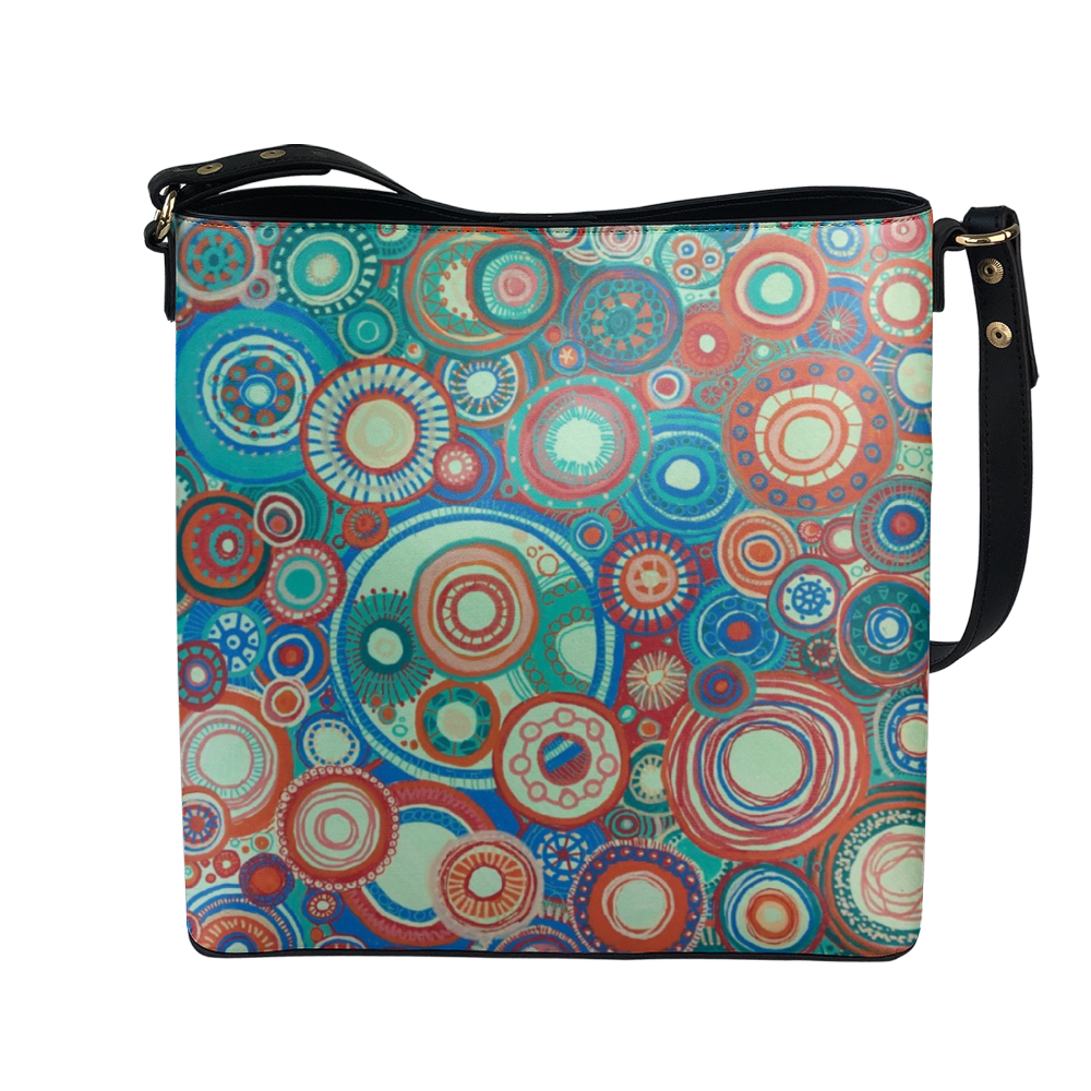 Shoulder bag with intricate and contrasting orange green colour scheme
