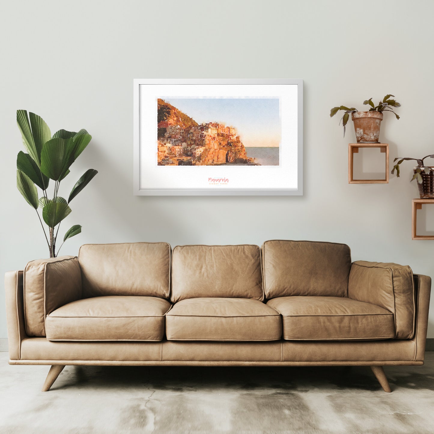 A loungeroom scene with Italian cliff village scene in the late afternoon.