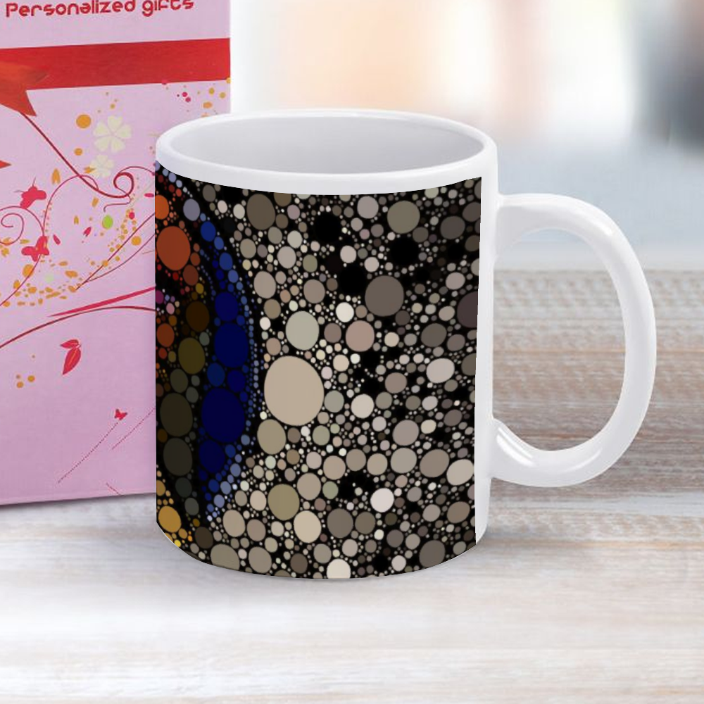 On a desk Mug with dot design right around