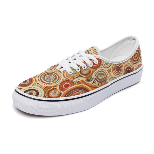 Sneakers with intricate pattern of interlocked circles in a ginger colour scheme