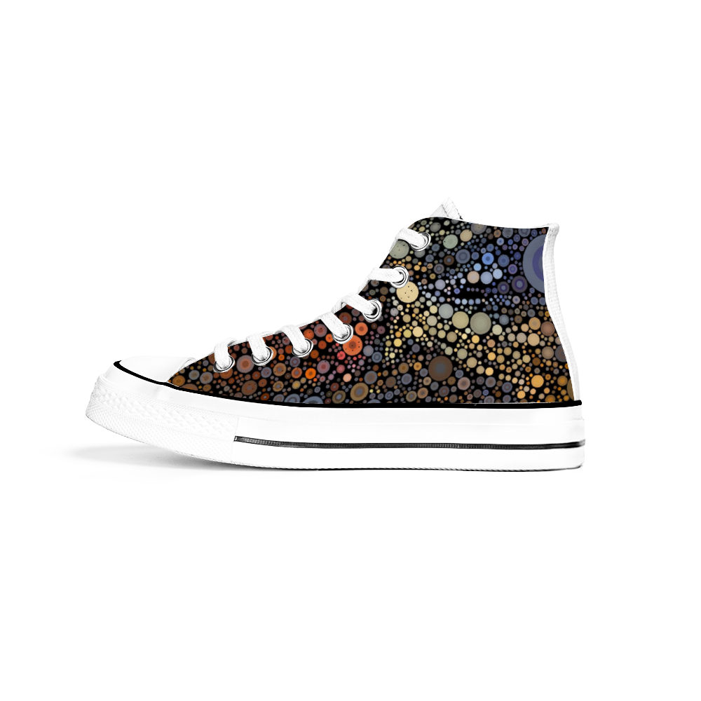 Side view Gymboot style canvas shoe, white sole and laces, an explosion of fiery dots on black background