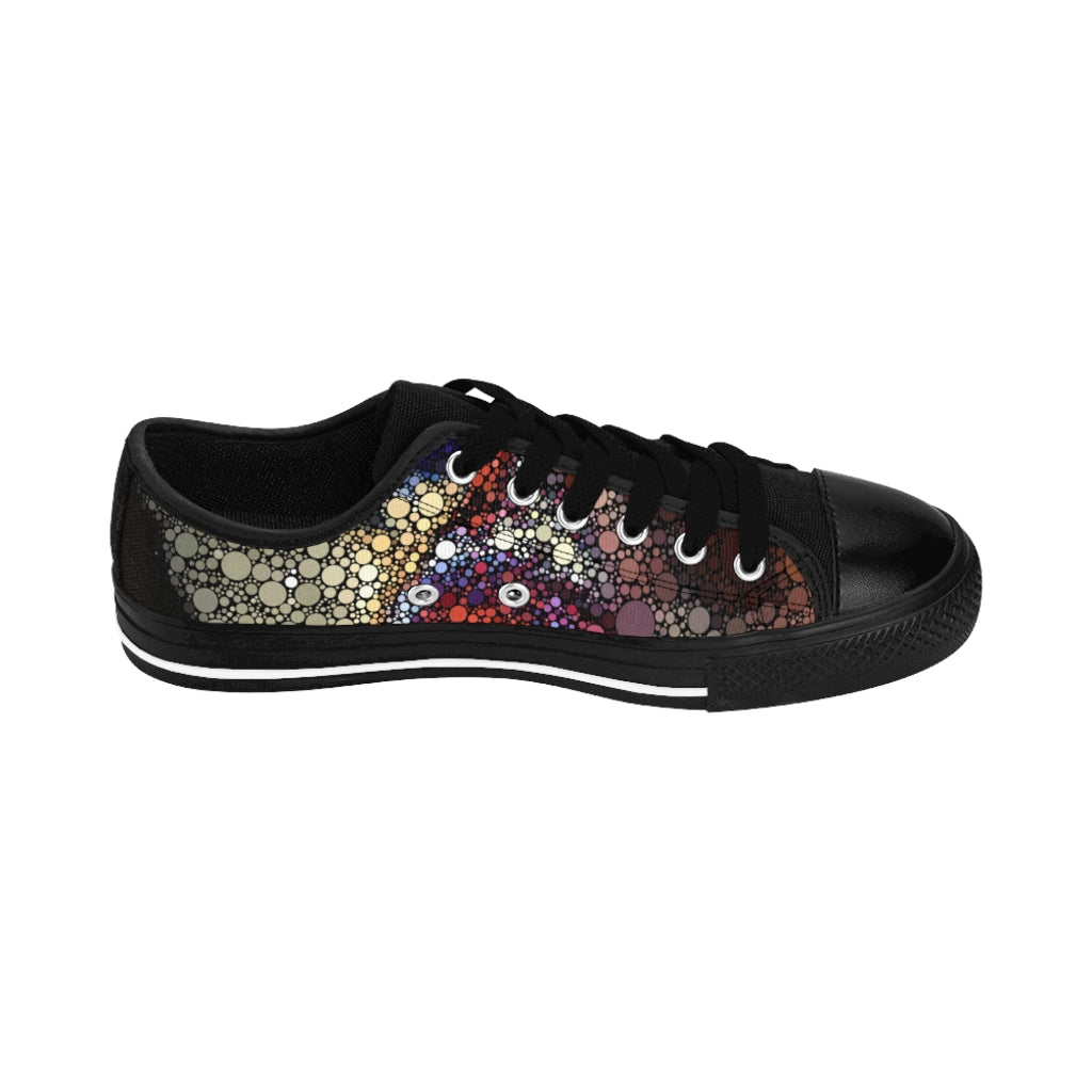 Side View Low top shoe, black sole and tongue, with fiery spot patt0ern