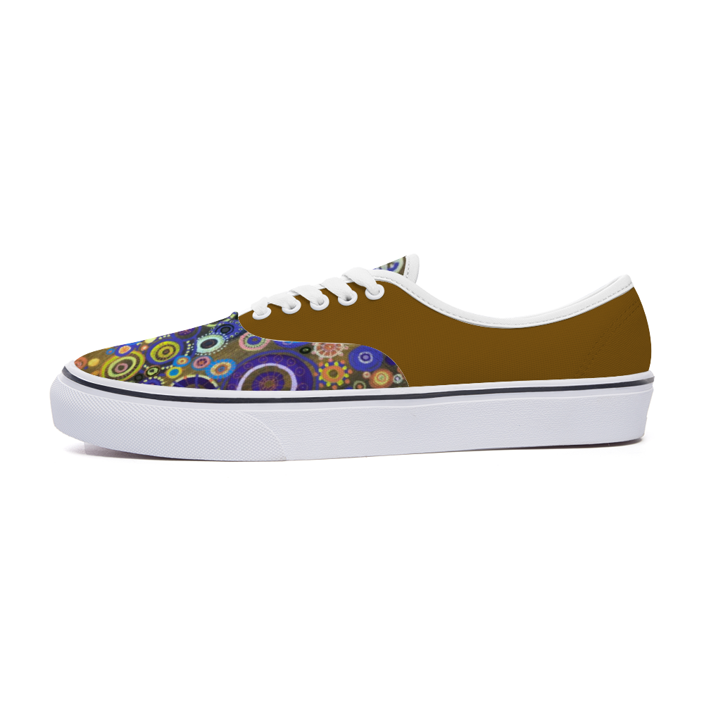 Sneakers with bright intricately coloured front and mustard dull back