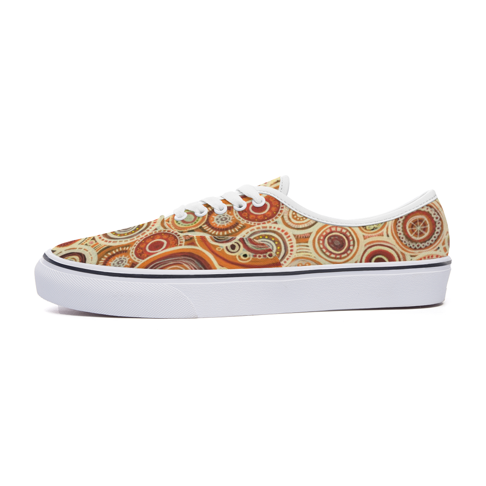 Sneakers with intricate pattern of interlocked circles in a ginger colour scheme