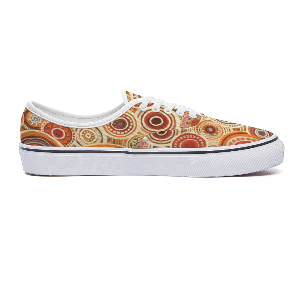 Sneakers with intricate pattern of interlocked circles in a ginger colour scheme