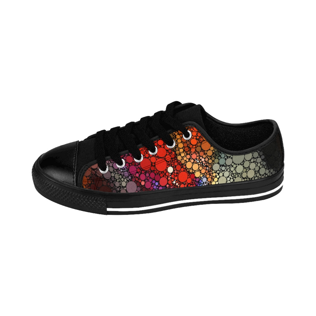 Side View Low top shoe, black sole and tongue, with fiery spot patt0ern