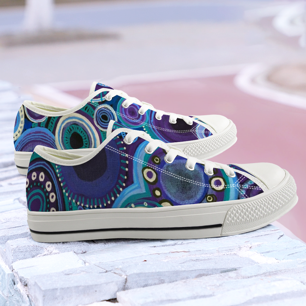 Sneakers with deep purple and blue design and white details