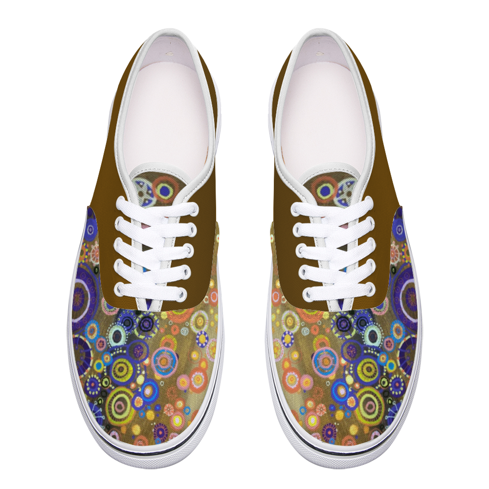 Top Sneakers with bright intricately coloured front and mustard dull back