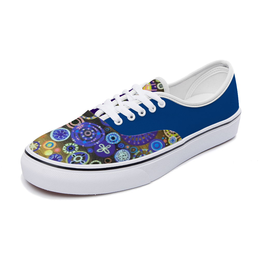 Sneakers with bright intricately coloured front and dark blue back