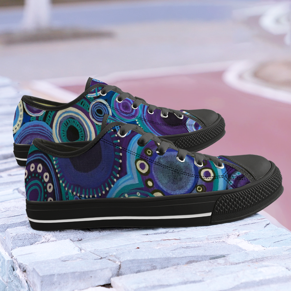 Sneakers with deep purple and blue design and black details