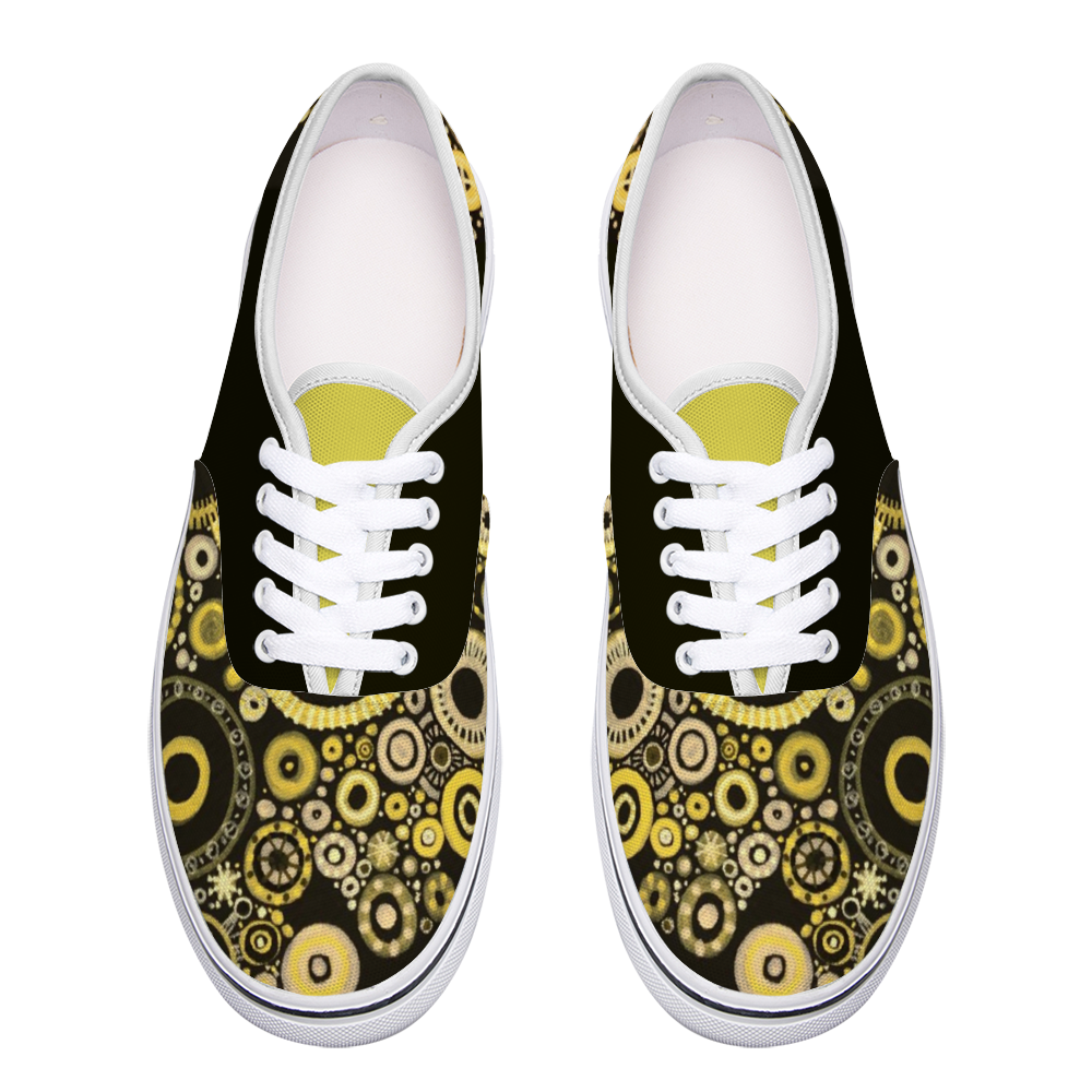 Top Sneakers with sunshine and bumblebee tones with a black back and yellow tongue