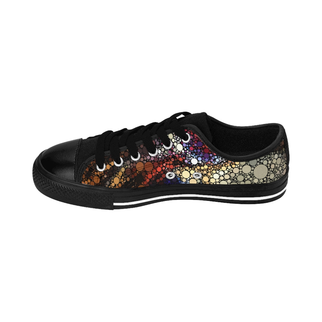 Side View Low top shoe, black sole and tongue, with fiery spot patt0ern